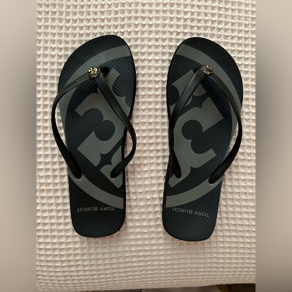 Tory Burch black and grey logo flip flops